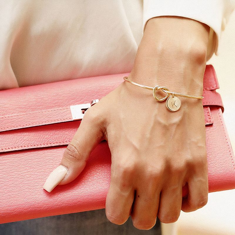 Bracelet jonc avec médaille