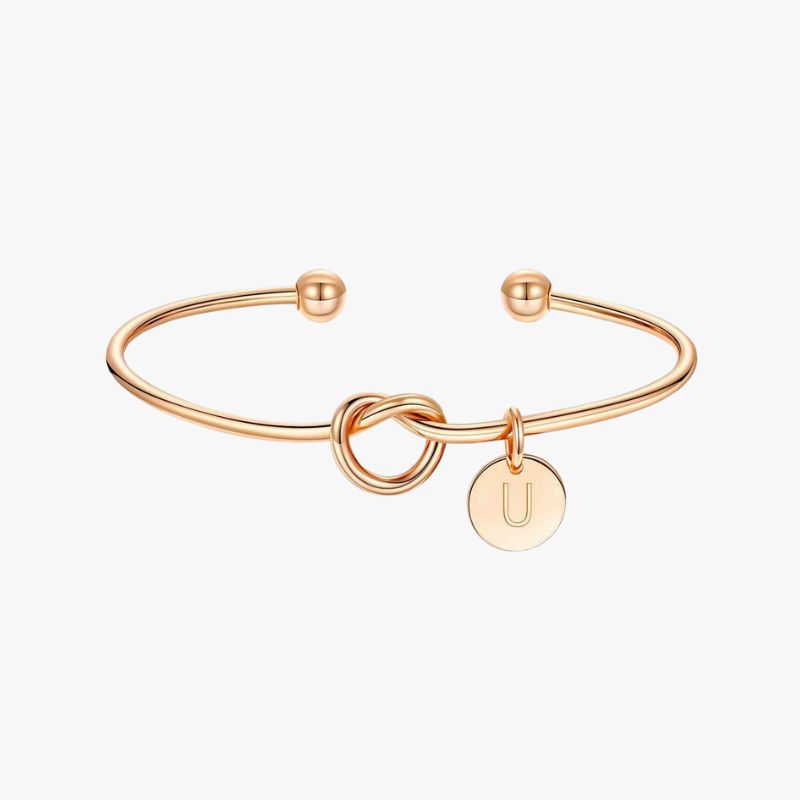 Bracelet jonc avec médaille
